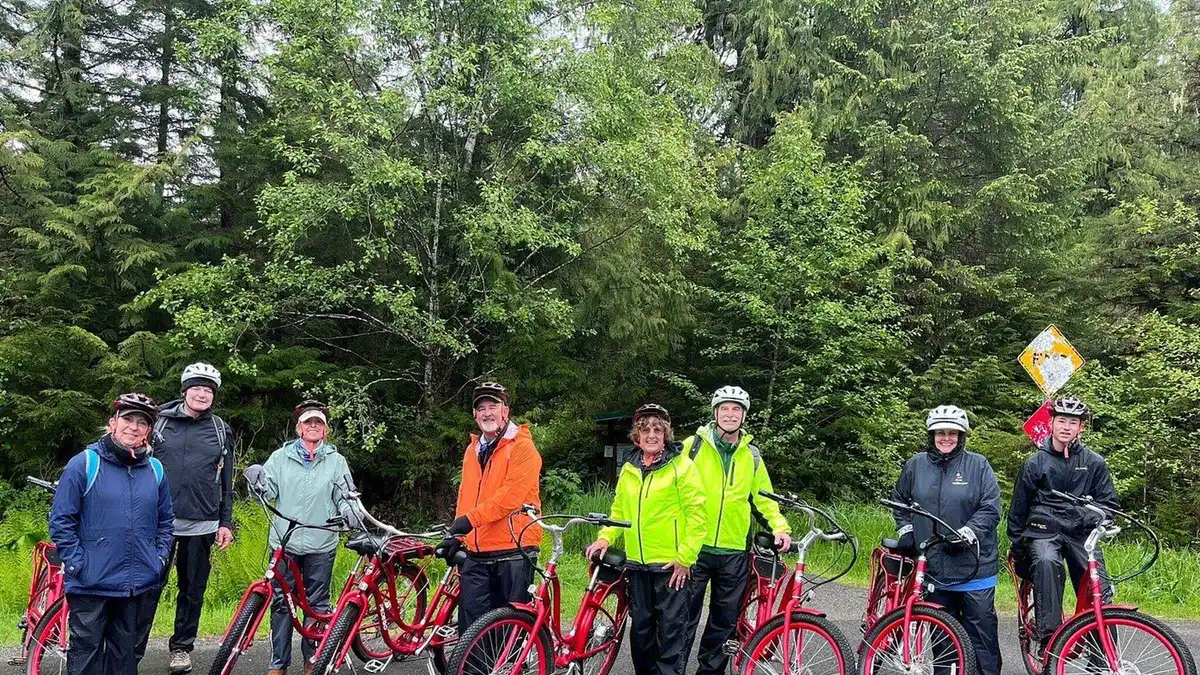 An electric bike parked at a trailhead in the Tongass on an e-bike and hike tour in Ketchikan, Alaska