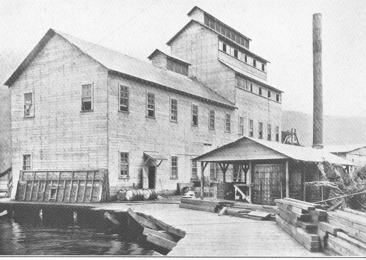 The timber fish-reduction plant on pilings at Wards Cove near Ketchikan in 1915, decades before the Ketchikan pulp mill stood on the same shore
